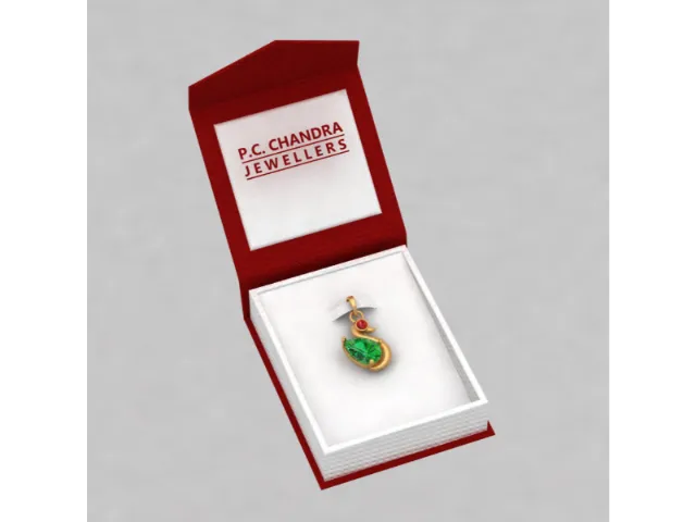 14k Unique Duck Shaped Pendant Adorned With Green And Red Stone